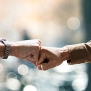 people bumping their fists