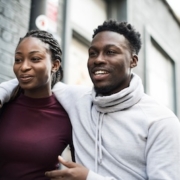 Happy couple walking around in the city
