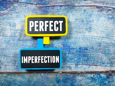 A visual representation of the balance between perfection and imperfection, highlighting the shift toward excellence in men's mental health.