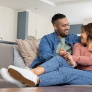 A couple sitting together discussing their relationship connection spectrum and emotional expectations.